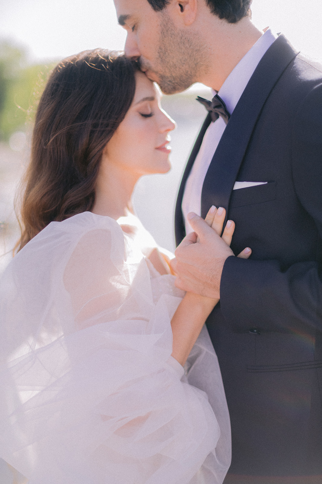 Man kissing his wife